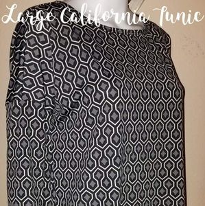 Silky flowy stretchy tunic with a cool design